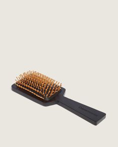 The Brush de Pelo is a sustainable paddle brush developed with thick hair in mind. Its bamboo pin bristles gently detangle hair without snagging or breaking strands, while the rounded top bristles stimulate blood flow to the scalp and increase shine by distributing hair’s natural oils. Made of regenerative bamboo instead of synthetic plastic, it’s good for La Tierra and your hair. Healthy hair looks good on you. Detangle Hair, Hair Quiz, Paddle Brush, Scalp Health, Hair Detangler, Frizz Control, Hair Scalp, Recycled Bottles, Hair Routines