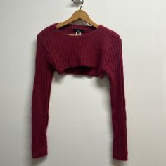 Lulus Cropped Ribbed Long Sleeve Sweater. Acrylic/Nylon. Casual Red Cropped Long Sleeve Sweater, Red Long Sleeve Cropped Sweater, Red Stretch Long Sleeve Crop Top, Burgundy Crop Sweater, Red Cropped Cardigan, Crochet Cropped Sweater, Super Cropped Sweater, Sweater Cropped, Sweater Tops