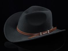 At a party, everyone will know your name.- principal gift The genuine nice shiny cowhide cowboy hat band even with your initials or name on it or whatever you want. The text is between two silver beads - pretty cool. You can receive it without any text on it if the style fits your hat. Western hat bands are suitable for men and women.  The leather hat bands are nice hat accessories in a minimalist way to add to your hat or a simple minimalist touch. - boho hat band You can choose  - Without any Leather Hat Bands, Western Hat Bands, Cowboy Hat Band, Cowboy Hat Bands, Principal Gifts, Hat Western, Hat Bands, Mens Hat, Know Your Name