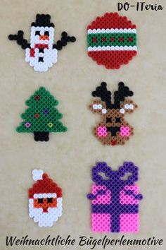 christmas ornaments made out of perler beads are displayed on a white surface with the words do - it - yourself written in german