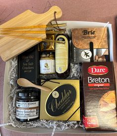 an assortment of food and condiments in a box