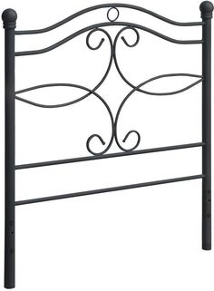 a metal headboard with scroll designs on the top and bottom posts, in black