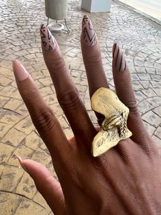 This stunning bronze ring is handcrafted with intricate detailing of the African continent, making it a unique statement piece that is sure to catch the eye. The ring features a smooth and comfortable band that makes it easy to wear every day or on special occasions. The bronze material gives the ring a beautiful and rustic look that adds to its charm. This ring is perfect for anyone who loves Africa, enjoys unique jewelry, or is looking for a one-of-a-kind gift. It comes in a range of sizes to fit any finger and arrives in a beautiful gift box, ready to be gifted to someone special or as a treat for yourself. Add this gorgeous bronze Africa ring to your jewelry collection today and showcase your love and appreciation for the continent. Artistic Gold Metal Rings, Bohemian Gold Ring With Copper, Handmade Bronze Rings, Unique Open Ring In Bronze, Unique Bronze Open Ring, Unique Bronze Metal Ring, Bohemian Bronze Metal Rings, Unique Gold Copper Rings, Unique Gold-colored Copper Rings