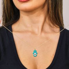 ✨ Elevate your style and embrace protection with our Turquoise Enamel Hamsa Pendant Necklace crafted from 925 Sterling Silver! 🌟 This exquisite necklace features a stunning Hamsa pendant adorned with vibrant turquoise enamel, symbolizing protection, luck, and good fortune. 🍀 Made with the finest quality sterling silver, it radiates elegance and durability, ensuring it remains a cherished piece in your collection for years to come. The intricate detailing and vibrant colors of the turquoise ena Amulet Style Charm Necklace With Adjustable Chain As Gift, Sterling Silver Charm Necklace With Adjustable Chain, Spiritual Blue Tarnish Resistant Jewelry, Symbolic Birthstone Jewelry For Gift, Amulet Charm Necklace With Adjustable Chain As Gift, Symbolic Necklace With Adjustable Chain As Gift, Symbolic Turquoise Necklace For Gift, Symbolic Gift Jewelry With Birthstone, Symbolic Blue Jewelry As Gift