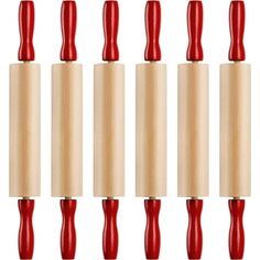 six red wooden rollers lined up in a row on a white background, with the top one turned upside down