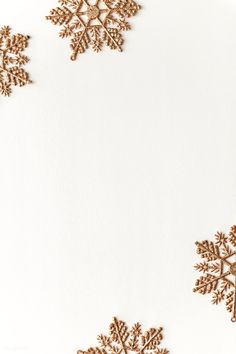 snowflakes on white paper with gold foil