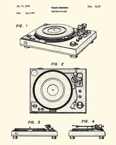 an old record player with its turntable on it's side, and the other parts