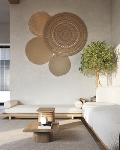 a living room filled with furniture and a plant on top of a wooden coffee table