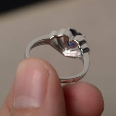 This is a gorgeous handmade creation. Its beauty is its simplicity & Elegance. The 6*6 mm heart cut faceted lab Sapphire is crafted in solid sterling silver and with rhodium plated. All item is sent in a beautiful gift box If you have any idea of design your ring,pls contact me directly. You can realize more lovely stuff clicking the link https://www.etsy.com/shop/knightjewelry?refshopsection_shophome_leftnav Please leave the correct address and you phone number for delivering successfully. Elegant Polished Heart Cut Ring, Sterling Silver Diamond Cut Topaz Ring For Promise, Sterling Silver Diamond Cut Topaz Promise Ring, Heart-shaped Rings With Polished Finish For Wedding, Heart-shaped Polished Wedding Ring, Heart-shaped Wedding Rings With Polished Finish, Fine Jewelry Sterling Silver Birthstone Ring With Diamond Cut, Sterling Silver Heart Cut Topaz Promise Ring, Anniversary Heart Cut Topaz Ring In Sterling Silver