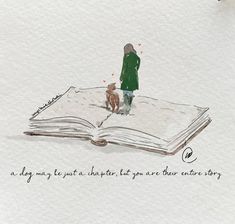 an open book with a drawing of a person and a dog standing on top of it