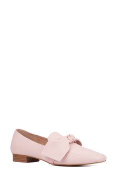 A large scale bow adds fun detail to a square, apron toe loafer with versatile style. 0.71" heel Square apron toe Bow detail Slip-on Manmade upper and sole Imported Pink Spring Loafers For Formal Wear, Spring Formal Flats With Bow, Pink Formal Loafers For Spring, Pink Flats For Office In Spring, Summer Workwear Flats With Bow, Spring Office Flats With Bow Detail, Spring Office Flats With Bow, Spring Bow Loafers For Work, Trendy Spring Loafers With Square Toe