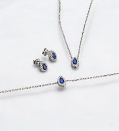 Royal Blue Bridal Jewelry Set, is perfect for your loved one. A perfect gift for mom, daughter, wife, girlfriend, classmates and friends. A clear choice for Graduation Gift, Mother's Day gift, Valentine's Day gift, a uniquely beautiful necklace that you can treasure forever. Adding a new dimension to your colorful diamond. Get your newest piece to elevate your outfit because, remember, your day deserves a dark blue whisper just like the beautiful seas. You may also like this bracelet suitable for this set. https://www.etsy.com/uk/listing/1334603472/925-sterling-silver-blue-sapphire Necklace chain length is 18''. * Handmade with love ♡ * Material: 925 Sterling Silver * Finish: 18K Gold, 18k Rose Gold, 925 Sterling Silver * Package: All Jewelry will be carefully packaged and sent in a beauti Blue Birthstone Jewelry For Wedding, Blue Birthstone Wedding Jewelry, Hand Set Teardrop Jewelry As Gift, Blue Fine Jewelry For Gifts, Fine Blue Jewelry For Gifts, Blue Jewelry Sets For Wedding, Dainty Blue Cubic Zirconia Jewelry, Blue Round Jewelry Sets For Wedding, Elegant Hypoallergenic Sapphire Jewelry