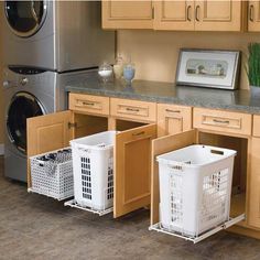 the kitchen is clean and ready to be used as a washer and dryer