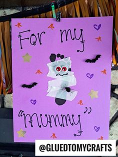 a purple sign with bats on it that says for my mommy