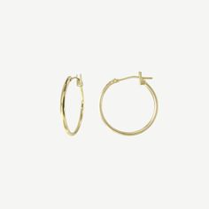 Details Available in 14k yellow gold Gold hoops measure 17mm 1.25mm hoop thickness Y-catch closure Sold as a pair (two earrings) Shipping, Processing, & Returns All sales final Made to order 5-7 business days shipped Shown with the 14k Diamond Huggies in Yellow Gold Two Earrings, Diamond Huggies, Gold Hoops, Guinea Bissau, Mozambique, Gold Gold, Ring Bracelet, Caribbean Netherlands, Kenya