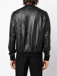 Find PHILIPP PLEIN Logo-patch Leather Bomber Jacket on Editorialist. logo-patch leather bomber jacket from PHILIPP PLEIN featuring black, sheepskin, logo patch at the chest, mini logo tag, ribbed band collar, ribbed cuffs, ribbed hem, two side welt pockets, long sleeves and straight hem. Black Outerwear With Logo Patch For Work, Luxury Leather Outerwear With Ribbed Cuffs, Black Leather Outerwear With Ribbed Cuffs, Luxury Black Leather Jacket With Padded Collar, Designer Black Biker Jacket With Padded Collar, Mini Logo, Mini Logos, Philipp Plein, Band Collar