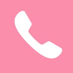 a white phone on a pink background