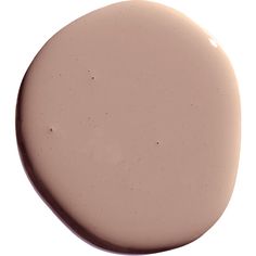 a close up view of the top of a round, light pink paint bottle with no lid