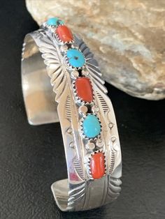 Masha Indian Native American Jewelry   -On Route 66 -         Albuquerque, New Mexico U.S.A   Item Specifics Regional Style: Native American Stone: Kingman Turquoise & Coral Size: 6.25" Gap: 1.10" Top Measurement: 0.5" Color: Blue & Red Tribal Affiliation: Navajo Artisan: S Metal: Sterling Silver Purity: 925 Made in USA SKU: 12315 Genuine Sterling Silver Jewelry  This beautiful Bracelet is made from all 925 Sterling Silver. These pieces are painstakingly handmade by the artist creating the perfe Native American Jewelry Diy, Antique Turquoise Jewelry, Navajo Silver Jewelry, Jewlery Rings, Nashville Outfit, Antique Turquoise, Turquoise Jewelry Native American, American Indian Jewelry, Southwest Jewelry