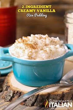 two ingredient creamy vanilla rice pudding in a blue bowl with spoons on the side