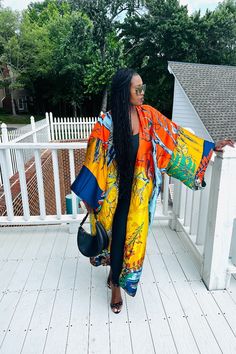 Rich Auntie at it's finest! Our fashion satin kimono can be worn as an oversized dress on it's own or cinched at the waist for a more fitted look. Flowy and colorful style definitely can make this a beach coverup or vacation look. In One Size fits most as the sleeves are open flowy and the kimonos have an open front. Size US Size One Size Multicolor Silk Robe For Spring, Fall Vacation Robe With Kimono Sleeves, Multicolor Long Robe For Fall, Long Satin Summer Robe, Multicolor Robe With Kimono Sleeves For Fall, Satin Kimono With Kimono Sleeves For The Beach, Spring Satin Kimono With Kimono Sleeves, Beach Kimono With Satin Material And Kimono Sleeves, Beach Kimono With Satin And Kimono Sleeves