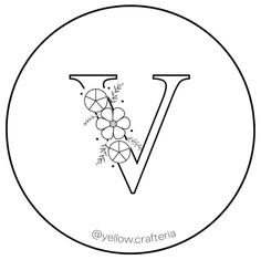 the letter v is decorated with flowers and leaves in black and white, on a circle