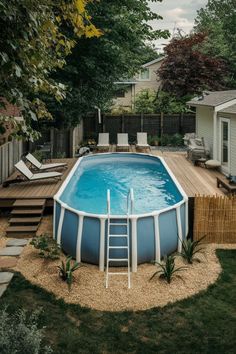 an above ground pool with steps leading up to it and a deck in the background