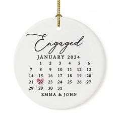 a personalized ornament for an engaged couple on their wedding day is shown