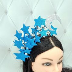 Each part Blue celestial crown is 100% hand made. Each parts Moon goddess crown is made by my hands with love for you. This Star fascinator is made of glitte foam. The base of the Space headband is made of wire that is wound with a floral tape. The stars are made by hand and fastened to the base with felt.  The height of the star crown is about 4 inches (10.5 cm). More of my star crown you can see here  https://www.etsy.com/ru/shop/byIraFomina?ref=hdr_shop_menu&section_id=24362623 Thank you for attention. Have a nice day. Blue Crown Headpiece For Party, Blue Party Crown Headpiece, Space Headband, Moon Goddess Crown, Celestial Crown, Star Crown, Goddess Crown, My Star, Floral Tape