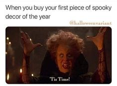 a woman with her hands in the air and an image of a creepy clown saying, when you buy your first piece of spooky decor of the year at halloween