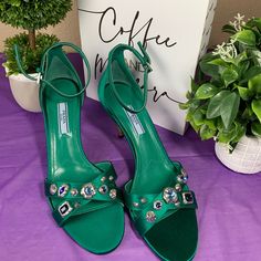 Bnib. Satin Green Sandal. Suoer Elegant With Rhinestones On The Heels. Sz 38.5. Sold As Is. Designer Ankle Strap Sandals With Rhinestones, Designer Sandals With Rhinestones And Open Heel, Designer Rhinestone Sandals With Open Heel, Designer Embellished Sandals With Open Heel, Designer Embellished Ankle Strap Heels, Designer Embellished Heels With Ankle Strap, Designer Green Sandals For Party, Designer Embellished Open Toe Sandals, Luxury Green Evening Sandals