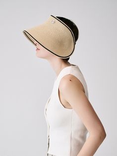 Editor's Notessieor presents unique and stylish hats that add a cute accent to your look. - Visor hat style- Made of raffia fabric- Long and wide curved visor- Contrasting edge line- Vintage button embellished- Vintage and trendy mood Measurements (in.)One Size- Visor: 5.12 in.- Depth: 7.09 in.- Circumference: 22.05 ~ 24.41 in. Composition & Care- Material: 100% Raffia- Avoid direct heat and moisture- Natural dry in the shade if wet- Do not bleach- Do not iron- Do not dry Chic Cream Hat For Day Out, Summer Visor Hats For Day Out, Chic Beige Sun Hat With Short Brim, Chic Boater Hat With Uv Protection And Curved Brim, Chic Brimmed Hats With Uv Protection, Chic Short Brim Panama Hat, Chic Beige Cloche Hat For Kentucky Derby, Chic Beige Straw Hat One Size Fits Most, Chic Boater Hat With Short Brim