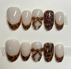 Hand made custom gel press on nails.  These nails are made to order specially for you! Whether you want to go the extra mile for a special event, or just want to feel fancy in your day to day life, these precious custom press on nails are for you. Tortoiseshell is trending right now, and let me tell ya, I'm no mad about it! These fancy little press ons are sure to impress, complete with a precious 3d bow detail, these French tip tortoiseshell nails are one of a kind.  Please note picture with instructions on how to measure your nails.  See instructions when choosing "custom" in size options Tortoiseshell Nails, Press On Nails French Tip, Fall Nail Art Ideas, Nails Bow, Press On Nails French, Bow Nails, Nails French Tip, Nails Gel Nails, Fall Nail Trends