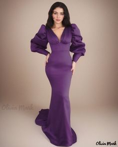 Olivia Mark - Formal Evening Gown with Open Back and Sheer Fabric - Ideal for Sophisticated Occasions Elegant Purple V-neck Gown, Purple Fitted V-neck Gown, Fitted Long Sleeve Purple Gown, Purple Fitted Long Sleeve Gown, Solid Fitted Evening Dress For Prom, Fitted Solid Color Evening Dress For Prom, Fitted Solid Color Prom Evening Dress, Purple Satin Gown For Formal Occasions, Formal Purple Satin Gown