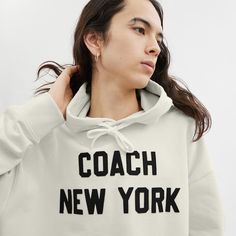 Add a heritage touch to your wardrobe with this classic-fit cotton sweatshirt. Detailed with our Coach New York graphic it’s finished with a drawstring hood and front kangaroo pocket. | Coach Hoodie Sweatshirt Size XXS - Cream Leisure Drawstring Hoodie Sweatshirt, Sporty Logo Print Hoodie For Loungewear, Sporty Drawstring Hoodie For Leisure, Sporty Sweatshirt With Drawstring For Leisure, Sporty Leisure Sweatshirt With Drawstring, Athleisure Sweatshirt With Drawstring For Leisure, Leisure Fleece Hoodie With Drawstring, Sporty Fleece Hoodie With Drawstring, Relaxed Fit Hoodie With Drawstring Hood For Leisure