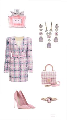 a pink and white outfit with accessories on it