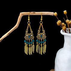 Material: Alloy Style: Ethnic Style Bohemian Alloy Earrings For Festivals, Bohemian Metal Tassel Earrings With Fringe, Bohemian Tassel Drop Earrings For Festivals, Bohemian Gold Tassel Earrings Gift, Gold Bohemian Tassel Earrings For Gift, Bohemian Metal Tassel Dangle Earrings, Bohemian Metal Dangle Tassel Earrings, Gold Tassel Earrings With Dangling Beads For Festival, Traditional Gold Tassel Festival Earrings