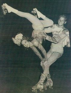 an old photo of two people on roller skates in the middle of a dance