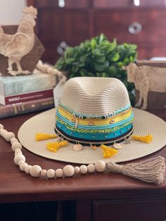 Handmade hat. Bohemian Beach Fedora In One Size, Bohemian Beach Fedora, One Size, One Size Flat Brim Vacation Hat, Bohemian Fedora Straw Hat, Bohemian One-size Fedora Straw Hat, Bohemian Mini Hat With Curved Brim For Beach, Bohemian Yellow Straw Hat With Short Brim, Yellow Bohemian Straw Hat With Short Brim, Yellow Bohemian Straw Hat With Curved Brim