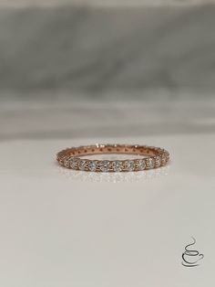 New In from our 2022 collection! Gorgeous Rose Gold Vermeil 2mm Full Eternity Band with Simulated Diamonds all around. Hand crafted in fine Sterling Silver and plated with Rose Gold it is guaranteed not to rust or turn your finger green. We picked the best 5A CZ diamonds available on the market to make this ring shine like real Diamonds! *Please note: We strongly recommend to avoid body lotion, harsh chemicals and water to make sure gold stays long. ⭐️If you concerned about gold fading and won't Vs Clarity Rose Gold Eternity Band For Promise, Vs Clarity Rose Gold Eternity Band As Promise Ring, Classic Rose Gold Eternity Band With Vvs Clarity, Rose Gold Round Cut Eternity Band With Halo, Rose Gold Halo Round Cut Eternity Band, Rose Gold Stackable Eternity Band, Rose Gold Eternity Band With Halo For Anniversary, Rose Gold Eternity Band With Halo, Rose Gold Halo Eternity Band