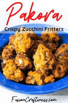 a blue plate filled with fried food on top of a white tablecloth and text that reads, pakora crispy zucchini fritters