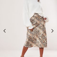 Petite Snake Print Midi Skirt Chic Cream Fall Skirt, Fall Cream Mini Skirt, White Winter Skirt For Day Out, Cream Lined Skirt For Fall, Cream Pleated Skirt For Fall, White Midi Skirt For Winter, Cream Midi Skirt For Day Out, Cream Flowy Skirt For Fall, Casual Cream Pencil Skirt