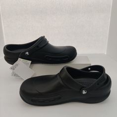 Elevate Your Workwear Game With These Crocs Bistro Clog Sneakers. Designed With A Closed Toe And Slip-On Closure, These Unisex Clogs Are Perfect For Travel, Casual Outings, And Work. The Black-Black Color Scheme And Unlined Interior Make Them A Versatile Addition To Your Shoe Collection. Crafted With Ethylene Vinyl Acetate Upper And Insole Material, These Crocs Are Lightweight, Waterproof, And Vegan-Friendly. The Ankle Strap Provides A Secure Fit, While The Slip-Resistant Rubber Outsole Ensures Non-slip Round Toe Clogs For Work, Waterproof Closed Toe Clogs For Work, Slip-on Workwear Clogs With Protective Feet, Non-slip Slip-on Clogs For Work, Casual Closed Toe Clogs With Protective Features, Non-slip Round Toe Functional Clogs, Slip-resistant Closed Toe Clogs For Workwear, Functional Non-slip Clogs With Round Toe, Functional Non-slip Round Toe Clogs