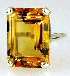 ALL OUR JEWELRY IS HANDCRAFTED IN THE U.S.A. This fine quality richly colored Bolivian Citrine with a wonderful golden -yellow hue set in a bold, traditional design. This is a comfortable solitaire ring made of solid 925 sterling silver. This is a great everyday ring that you'll wear everywhere, from the grocery to date night. makes a perfect gift. Citrine is the Birthstone for November. (1) Citrine, Emerald Cut, 18X13 MM - 14.95 Carats If you need this item for a special occasion let us know an Argentium Silver Jewelry, Citrine Ring Engagement, Everyday Ring, Emerald Cut Rings, Fine Ring, November 1, Everyday Rings, Citrine Stone, Argentium Silver