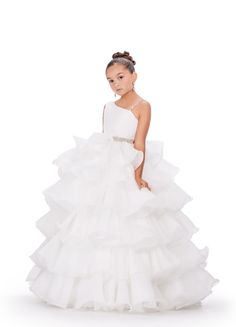 This Ashley Lauren Kids 8217 Long Ruffle Layer Girls Pageant Ballgown Bow Crystal Belt Gown is perfect for any special occasion! Elegantly crafted with an organza ball gown silhouette and one shoulder bustier, this dress also features beaded details along the waist line and luxurious ruffles throughout the skirt. The waistband and shoulder strap are both beaded for added glam. One shoulder Sizes: 4-16 Colors: Hot Pink, Aqua, Ivory White Ruffle Dress Long, Pageant Dresses For Kids, Comunion Dresses, Comunion Dress, Organza Ball Gown, Pageant Life, Kids Pageant, Gown Silhouette, Ashley Lauren