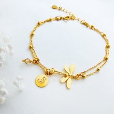 "The subtle Dainty layering dragonfly bracelet is truly beautiful- intricately detailed so sweet jewelry. May be worn on its own, or styled with the other. This is \"double face\" charm-same for both side , no worry on the pendant twist ! Matching earrings available :) ♡ DETAILS Pendant : 0.66\" x 0.78\" (17 mm x 2 cm) Material: 24 k gold plated Chain Lenght: - 5.5\" or 6.29\" 14 lub 16 cm plus extender chain ♡ PERSONALISATION How about adding one of my Swarovski birthstone pendants or initial ? Handmade Dainty Gold Plated Charm Bracelet, Dainty Handmade Gold Plated Charm Bracelet, Handmade Dainty Gold Charm Bracelet, Gold Dainty Handmade Charm Bracelet, Elegant Adjustable Dragonfly Jewelry, Dainty Handmade Gold Charm Bracelet, Adjustable Gold Dragonfly Jewelry, Delicate Adjustable Yellow Gold Charm Bracelet, Dainty Butterfly Charm Bracelets As Gifts