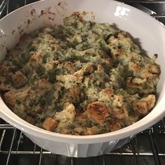 a casserole dish is sitting on the oven rack