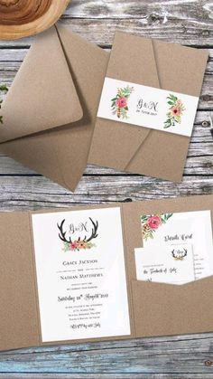 wedding stationery with deer antlers and flowers