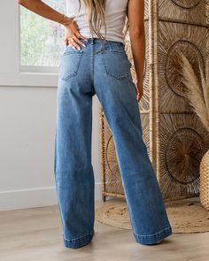 KanCan Sienna Non Distressed Wide Leg Jeans Medium wash Button up Non distressed Trouser hem Skinny fit Wide leg Okay stretch 99% Cotton 1% Spandex Imported Sizing: 1/24, 3/25, 5/26, 7/27, 9/28, 11/29, 13/30, 15/31 Model is wearing a size 3 True to size for KanCan Skinny Fit - size up if you are between sizes Need more sizing help? Check out our Jeans Sizing Guide here Measurements:12" Rise (high rise)31" inseam (size 3) 1/24: Waist: 12.5" 3/25: Waist: 13" 5/26: Waist: 13.5" 7/27: Waist: 14" 9/2 Stretch Bottoms With Button Closure In Light Wash, Spring Flare Jeans With Button Closure, Spring Full Length Flare Jeans With Button Closure, Solid Denim Bottoms, Washed, Solid Washed Denim Bottoms, Solid Color Washed Denim Bottoms, Spring Jeans With Buttons, Spring Solid Mid-rise Flare Jeans, Spring Mid-rise Flare Jeans