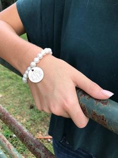 The three bracelets have been my SHOW SPECIALS this Fall at my holiday shows around the Southeast US. They are stretchy freshwater pearl bracelets that feature one of the three discs...silver, gold or antique brass. Engraved with your initials...just choose your finish and font! Wonderful bridesmaid gifts and also great for Sorority Lil Sis/Big Sis gifts. Classic Personalized Adjustable Pearl Bracelet, Personalized Adjustable Classic Pearl Bracelet, Classic Adjustable Personalized Pearl Bracelet, Adjustable White Monogram Jewelry, Classic Personalized White Pearl Bracelet, White Monogram Jewelry For Wedding, White Monogrammed Jewelry For Wedding, White Monogram Wedding Jewelry, Elegant Adjustable Initials Charm Bracelet